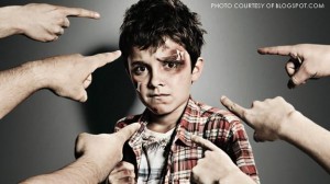 This bruised child with fingers of blame pointed at him represent the distorted relationship between bullies and their victims. The violent predator-prey interaction between both parties create bullies lacking empathy and victims who internalize bullying as a character flaw.