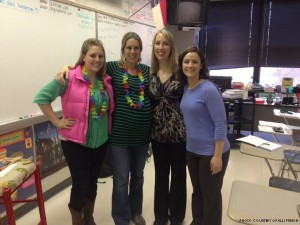 Señora Sollie (second from left) is surrounded by her friends and fellow language teachers Señorita Daniel, Señora Barnwell and Madame West. Everyone was excited to find out Sollie’s baby girl, Addison Palmer Sollie, was born on Valentine’s Day.