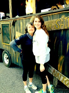 My mom and I pose in front of the “Who Dat Shack” float that we rode on. The theme for the parade, Caesar, was “Game Time” and it began at 6 p.m. on Saturday, February 22. 