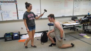 Juliet Simpson, current President and senior,  inducts next year’s President and junior, Alec Way. The tradition is for the gavel, with which the President leads meetings, to be passed from one President to another. 