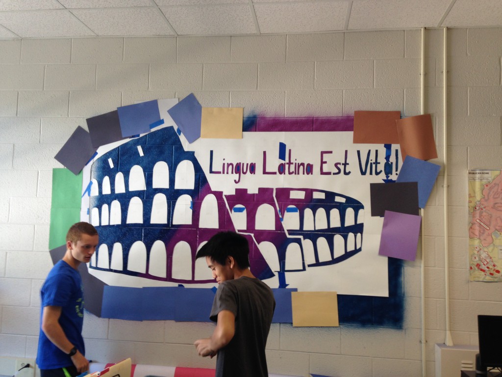 Following the AP exam, what can the AP Latin students do? How about paint symbols of gods and two columns? (Photo Courtesy of Jacob Phillips)