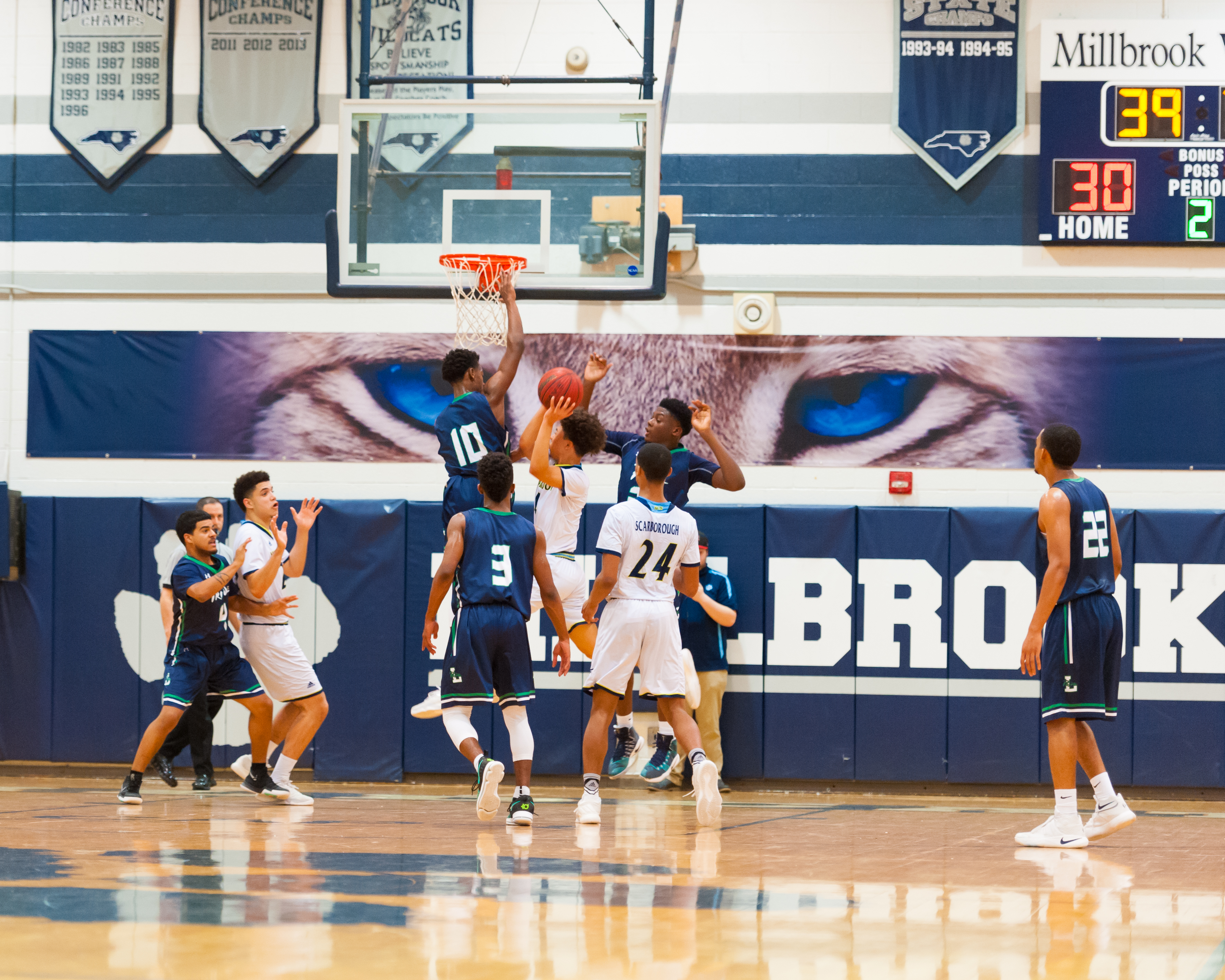 Pride men’s basketball can’t overcome Millbrook on the road
